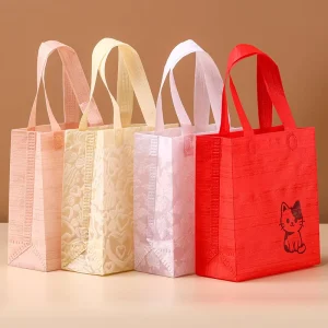 Milieuvriendelijke Geperforeerde Niet-geweven Supermarkt Handtas Cadeauzak voor Bruiloft Snoep Souvenir Kinderdag Valentijnsdag