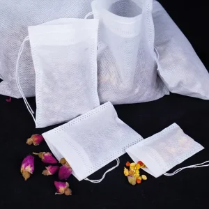 En stock, sachets de thé non tissés jetables 5*7 cm avec cordons en coton, sachets de thé à filtre, sachets de thé vides à sceller à chaud pour feuilles de thé en vrac