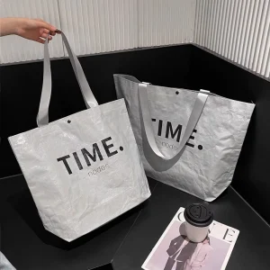 Borsa in tessuto intrecciato grigio chiaro per abbigliamento, imballaggio regalo, grande borsa per la spesa in PP con logo personalizzato