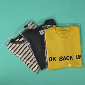Bolsa de camiseta con cremallera transparente de PE en stock lista, compostable con logo, bolsas biodegradables para empaquetar ropa