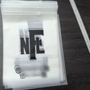 Wiederverwendbare PLA Maisstärke CPE Frosted Reißverschluss-Plastiktüte kompostierbare Zip-Verpackung für Socken und Schuhe für Bekleidungsverpackung