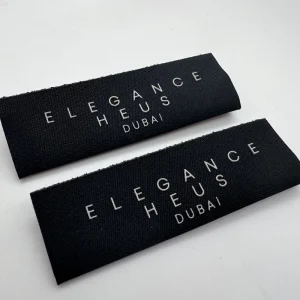 Etichetta personalizzata in silicone 3D goffrata, etichetta tessuta con logo del marchio per etichetta di camicia, vestito, borsa