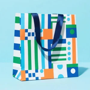 Sac laminé en papier blanc de luxe personnalisé avec impression offset, motif à pois, poignée en ruban pour emballage cadeau recyclable