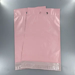 Benutzerdefinierte rosa Griff Poly-Mailer-Taschen, mit ausgestanztem Griff, selbstklebende, wasserdichte Versandtaschen für Boutique-Verpackungen