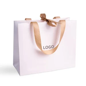 Borsa di carta bianca personalizzata con manico a nastro, confezione per la spesa con il tuo logo