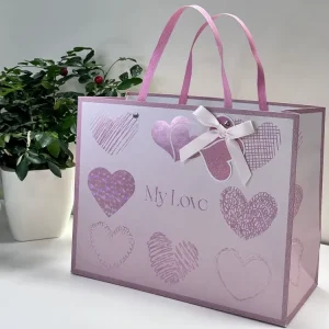 Sacs cadeaux laminés brillants personnalisés avec poignées en ruban, grands sacs de shopping (épaisseur 100gsm-450gsm)