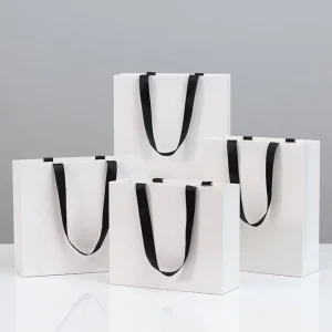 Sacs d'emballage personnalisés pour cadeaux avec impression de votre propre logo, sacs en papier avec poignées en ruban