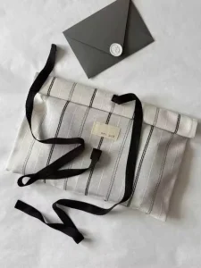 Bolsas de polvo de algodón orgánico ecológico para ropa interior, joyería y embalaje, con solapa y etiqueta personalizada