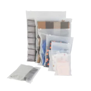 Op voorraad PE PVC aangepaste plastic poly zak met rits voor kledingverpakking