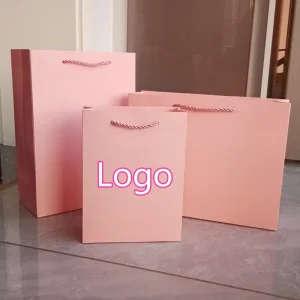 Bolsas de embalaje de ropa impresas con logo, bolsas de papel con asa, bolsa de compras de regalo de perfume con logo