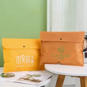 Bolsas de embalaje de ropa premium no tejidas personalizadas con logo, bolsas de compras de varias tamaños, fabricadas en China, MOQ 50pcs
