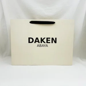 Sacs en papier imprimés personnalisés avec logos, emballage en papier de luxe avec poignées personnalisées