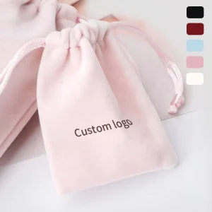 กระเป๋าใส่เครื่องประดับกำมะหยี่สีชมพูแบบเชือกดึง กระเป๋าบรรจุภัณฑ์เครื่องประดับพร้อมโลโก้ที่กำหนดเอง