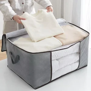 Bolsa de almacenamiento de equipaje no tejido acolchada portátil para juguetes y equipaje móvil familiar
