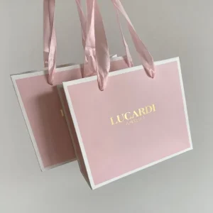 Borsa di carta bianca di lusso stampata personalizzata con logo in oro per shopping, regali, abbigliamento, confezione di vestiti con manico
