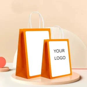 أكياس تغليف ورقية كرافت مطبوعة مخصصة مع تقنية الطباعة بالذهب، مناسبة لتغليف الملابس والهدايا وتغليف الملابس للبيع بالتجزئة